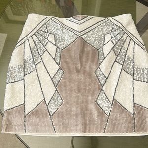 Express mini skirt. NWT. White with silver and tan sequins.